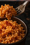 A cup of fluffy tomato-simmered Mexican rice.