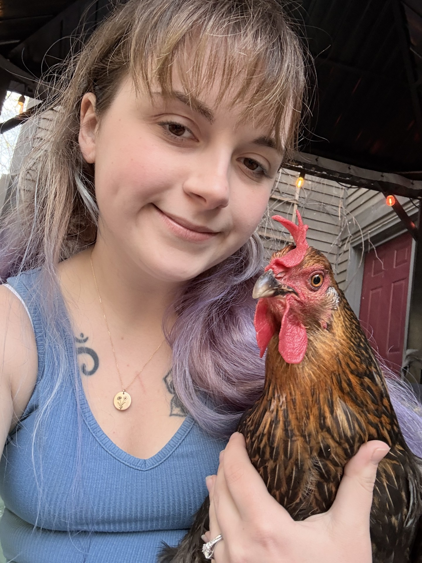 Olivia Keiter with Reba the hen